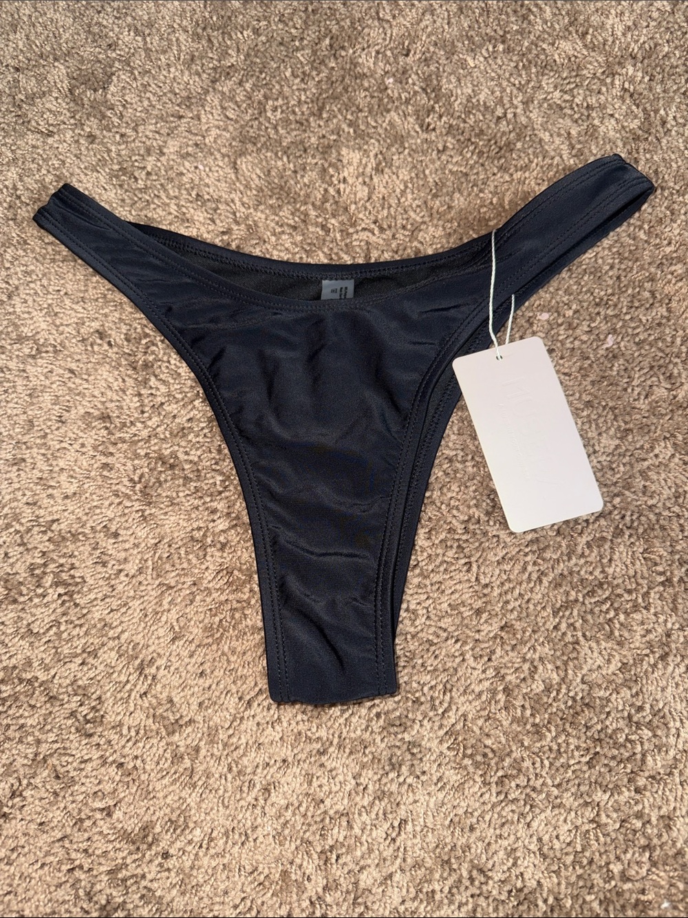 NWT musera black bikini bottoms